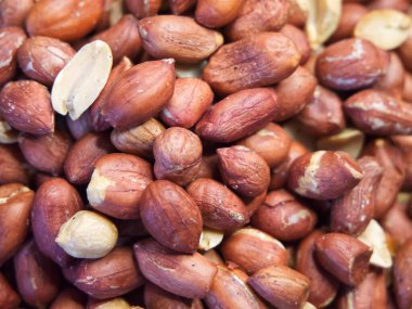 Kavrulmuş kabuksuz fıstık, yakın plan, arka plan olarak fıstık.