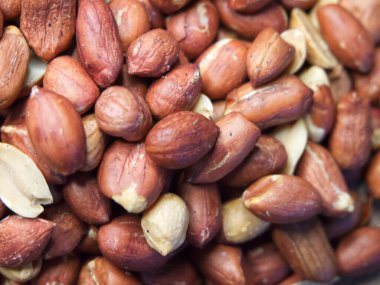 Kabuğu soyulmamış fıstık makrosu, arka plan olarak da fıstık. Fıstık / Yerfıstığı DokusuName