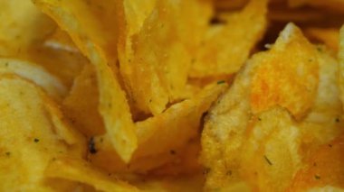 Salted potato chips close-up, full frame, video 4k.