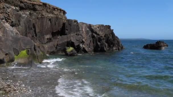 Summer Seascape Rocky Coast Small Sea Waves Handheld Video — Stockvideo