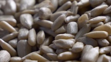 Sunflower seeds without shell, full-frame video full hd. Sunflower seeds close-up.