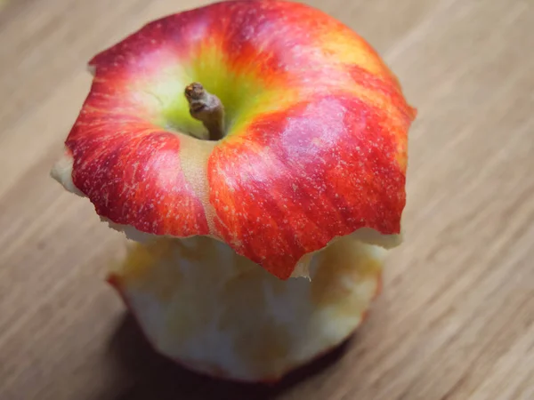 Red Apple Core Wooden Background Bitten Apple Close — ストック写真