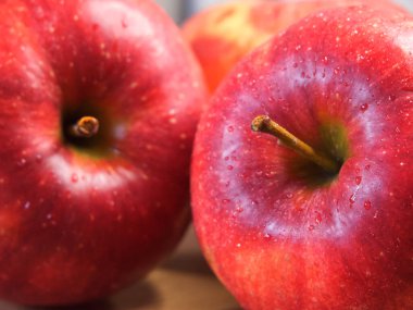 Delicious red apples photographed in macro. Ripe fruit.