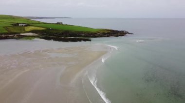 A cape on the Atlantic coast of Ireland. Picturesque expanses of water under a gray overcast sky. Seascape.