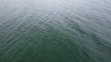 The surface of the sea, top view. Full frame video of the water surface. Seascape.