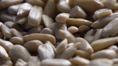 Sunflower seeds without shell, full-frame video full hd, close-up.