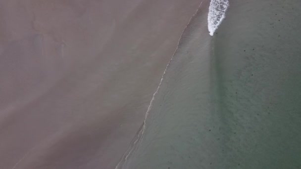 Tidal Waves Roll Sandy Shore Deserted Beach Aerial View Coastline — Stock videók