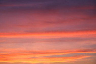 Bright sunset sky, full frame. The sky as a background. Colorful Sunset Sky