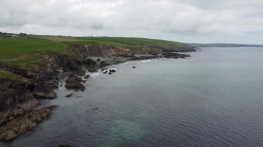 Flying over the beautiful coastline of the Celtic Sea in the south of Ireland near Clonakilty. Rocky seashore. Video in full hd format.