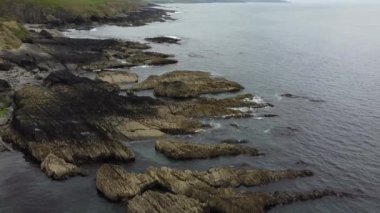 Huge rocks on the seashore. Rocky seashore, aerial view.