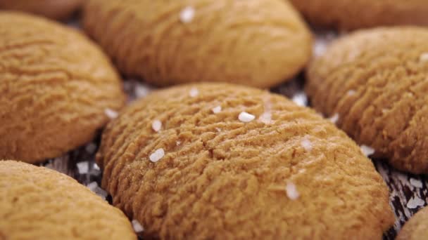 Sprinkling Coarse Salt Crystals Shortbread Cookies Slow Motion Macro Cooking — Stock Video