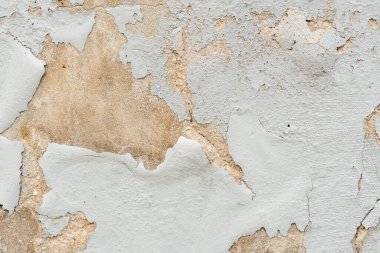 Eski soyulmuş duvar boyası. Soyut yıpranmış grunge arkaplanı.