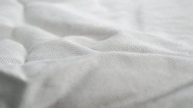 Buruşuk kumaş dokusu. Makro. Dolly vurdu. Kırışıklıklar ve kırışıklıklar kapanır