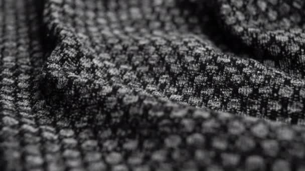 Czarny Materiał Tekstury Kropkowanym Wzorem Zgnieciona Syntetyczna Powierzchnia Plamki Makro — Wideo stockowe