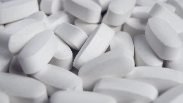 Vita Ovala Farmaceutiska Tabletter Medicinsk Industri Koncept Makro Dolly Sköt — Stockvideo