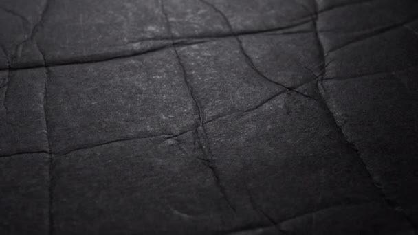 Czarny Grunge Zgnieciony Składany Poplamiony Papier Tekstury Makro Wolna Rotacja — Wideo stockowe
