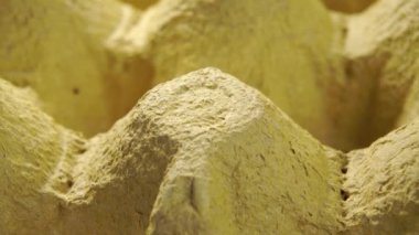 Geri dönüştürülmüş kağıt yumurta tepsisi kabataslak dokusu. Paketlenmiş doğal desen. Makro. Döndürme