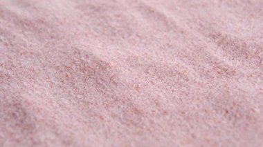 Gıda tozu turuncu boya yakın plan. Makro. Döndürme. Renk boyası