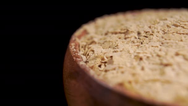 Nutritional Brewers Yeast Flakes Rustic Wooden Bowl Macro Rotation Natural — Stockvideo