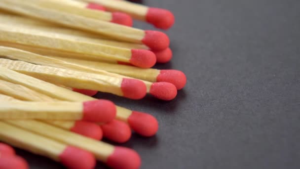Unlit Whole Matches Red Sulfur Black Paper Background Macro Rotation — Stock Video