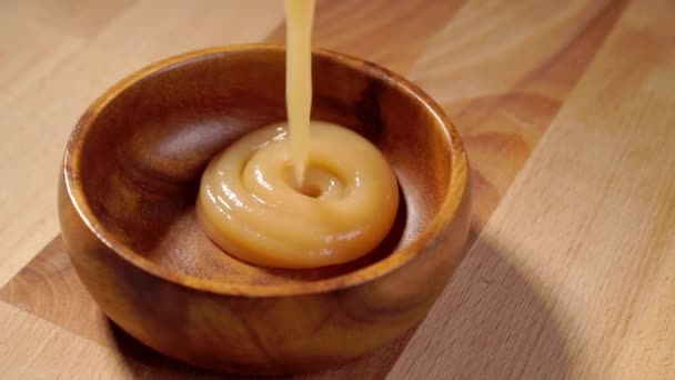 Pouring Applesauce Rustic Wooden Bowl Slow Motion Apple Puree Close — Stock Video