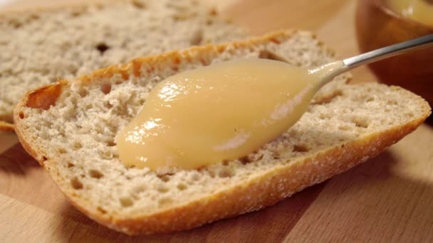 Spreading Applesauce Slice Brown Whole Grain Bread Close Wooden Rustic — Stock Video