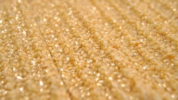 Textura Una Barra Cereal Con Semillas Sésamo Enteras Alimento Saludable — Vídeos de Stock