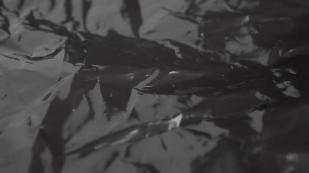Die Zerknitterte Schwarze Textur Aus Kunststoff Zerdrücktes Grunge Polyethylen Abstraktes — Stockvideo