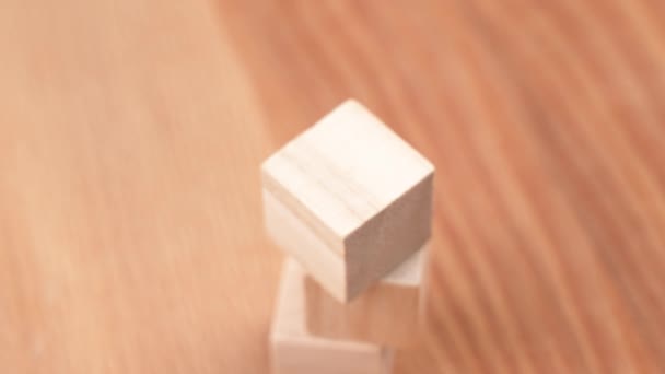 Hand Placing Green Toy Cube Top Tower Wooden Blocks Environmentally — Vídeo de Stock