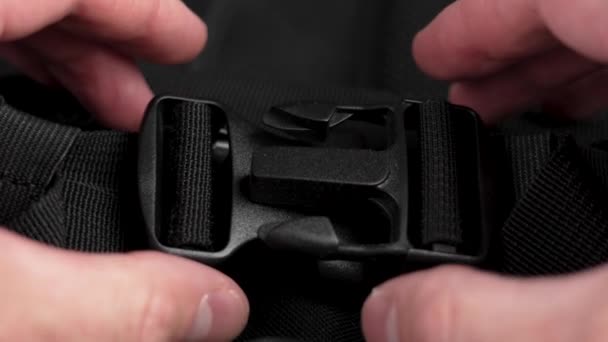 Locking Black Plastic Clasp Nylon Backpack Straps Close — Stock video