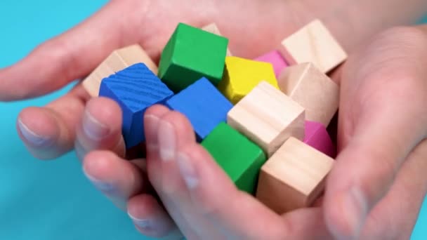 Pile Game Multicolored Wood Toy Cube Blocks Children Hands Blue — Stockvideo