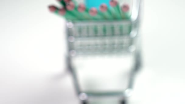 Group Graphite Pencils Mini Shopping Cart White Background Consumerism Back — Vídeo de stock