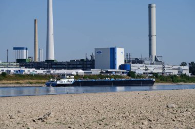 Cologne, Germany August 11, 2022: The Ford Motor Company in cologne at low water levels on the rhine