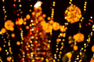defocused night shot of festive bokeh lights 