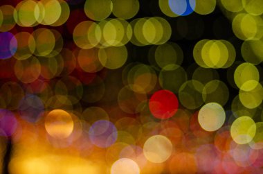 defocused night shot of festive bokeh lights 