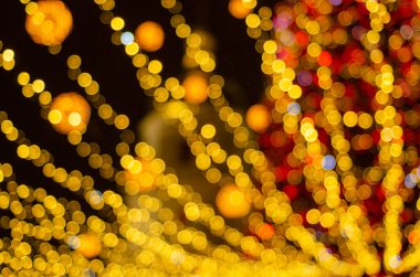 defocused night shot of festive bokeh lights 