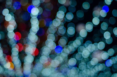 defocused night shot of festive bokeh lights 