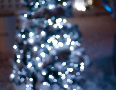 defocused night shot of festive bokeh lights 