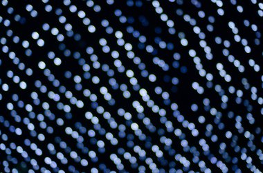 defocused night shot of festive bokeh lights 