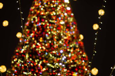 defocused night shot of festive bokeh lights 