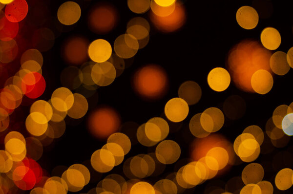 defocused night shot of festive bokeh lights 