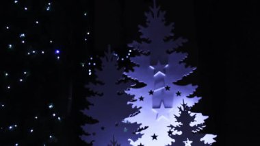 New Year and Christmas decorations are lit with garlands.