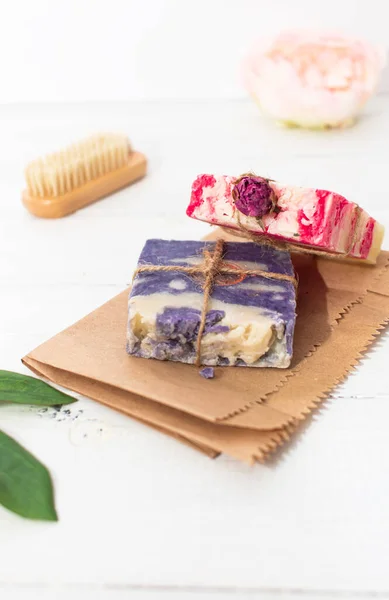 Handmade natural soap with rose and lavender on wooden background — Stock Photo, Image