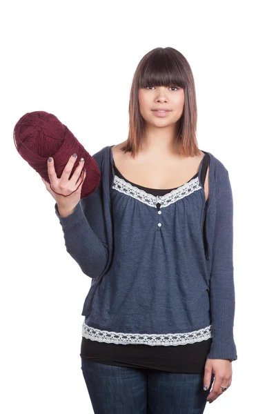 Young woman holds a ball of wool — Stock Photo, Image