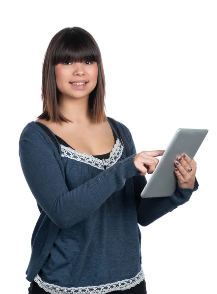 Young woman uses a tablet — Stock Photo, Image