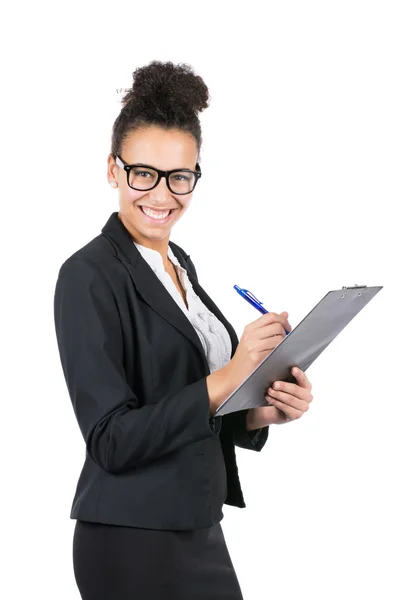 Young business woman uses a clipboard — Stock Photo, Image