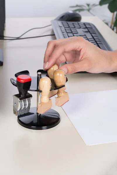 Woman takes a stamp — Stock Photo, Image