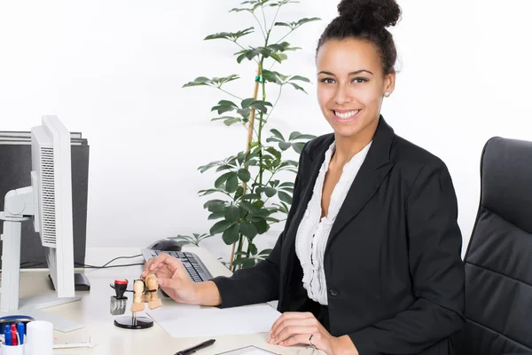 Office woman takes a stamp — Stock Photo, Image