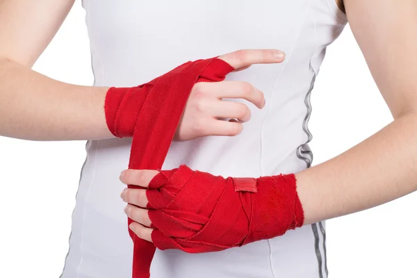 Woman is bandaging her hands — Stock Photo, Image