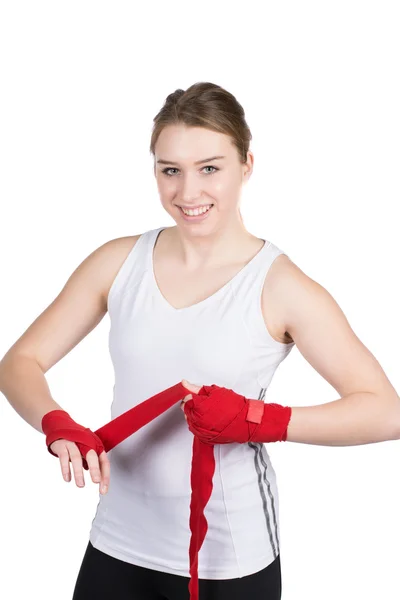 Woman is bandaging her hands — Stock Photo, Image